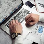 Blueprints, entrepreneur, hands — Fire Watch Services Near Me Offering Immediate Service and Certified Personnel
