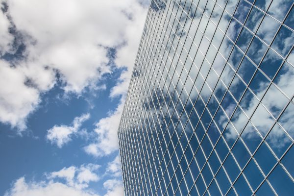 Building, reflection, clouds — Sophisticated Arrangements by Toronto Escorts
